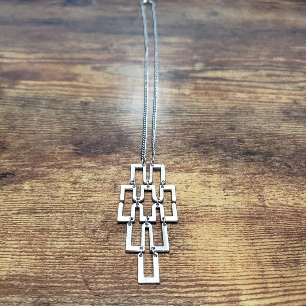 silver tone long statement necklace